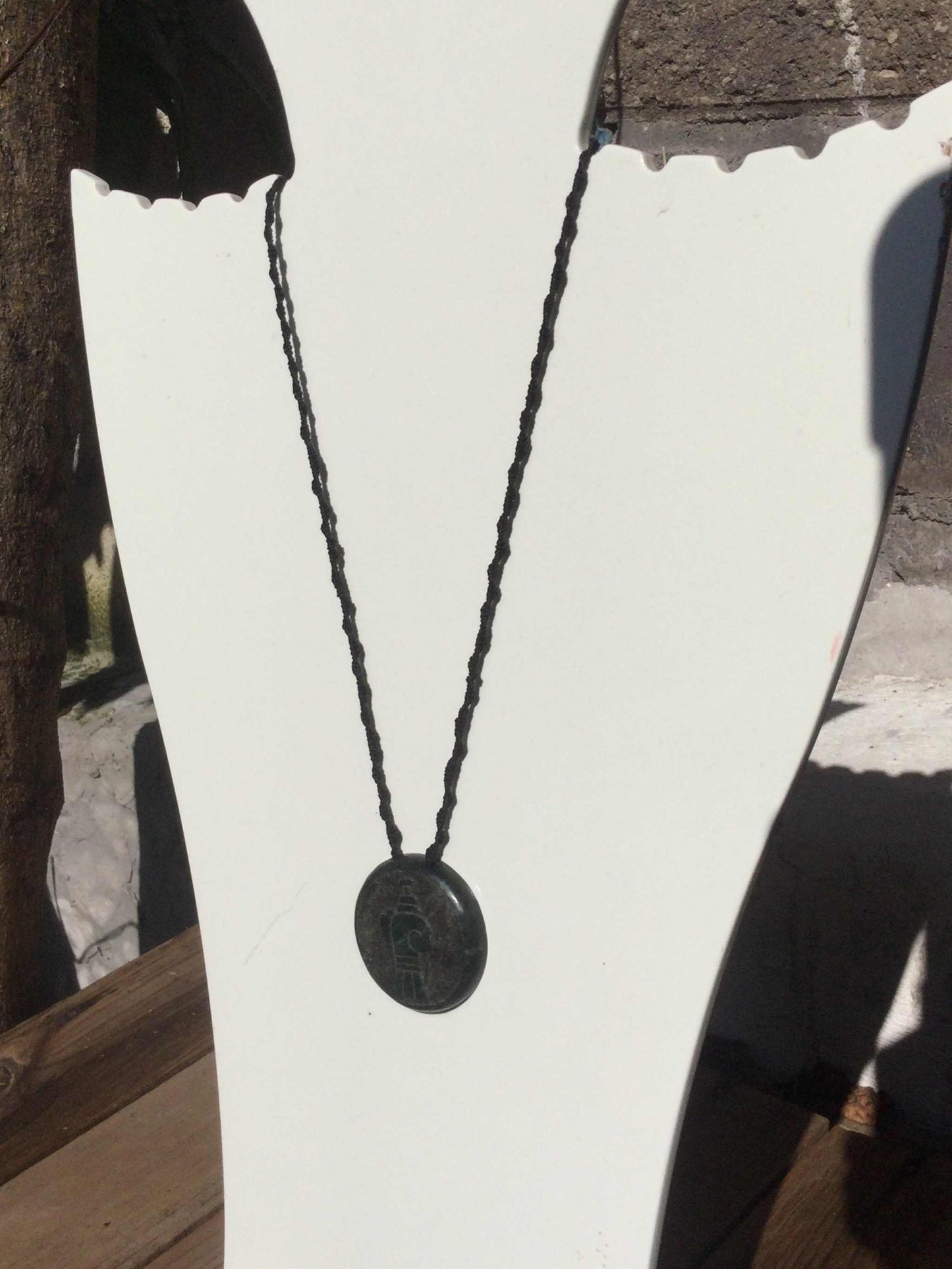 Olmec head pendant carved