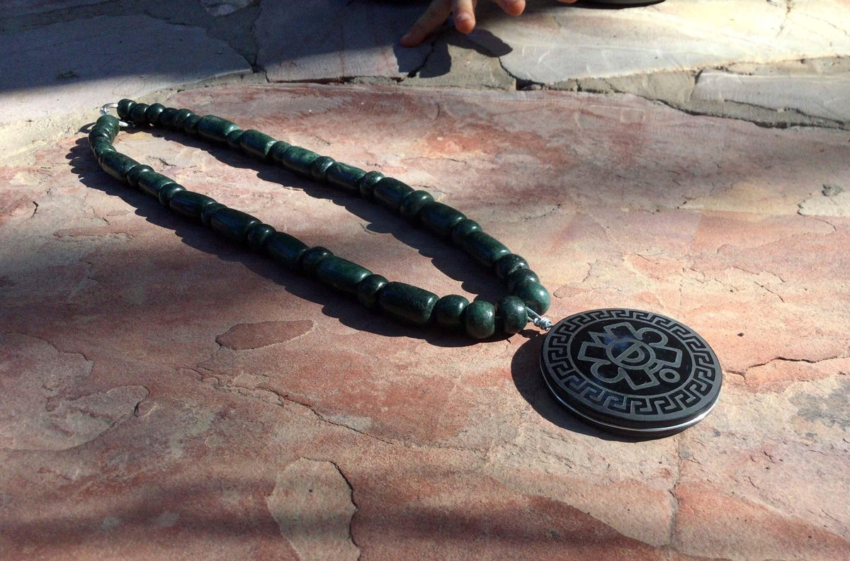 Ollin Pendant | Aztec Symbol of Movement | Hand-Carved Mexican Obsidian | 40mm | Macramé or Serpentine Necklace