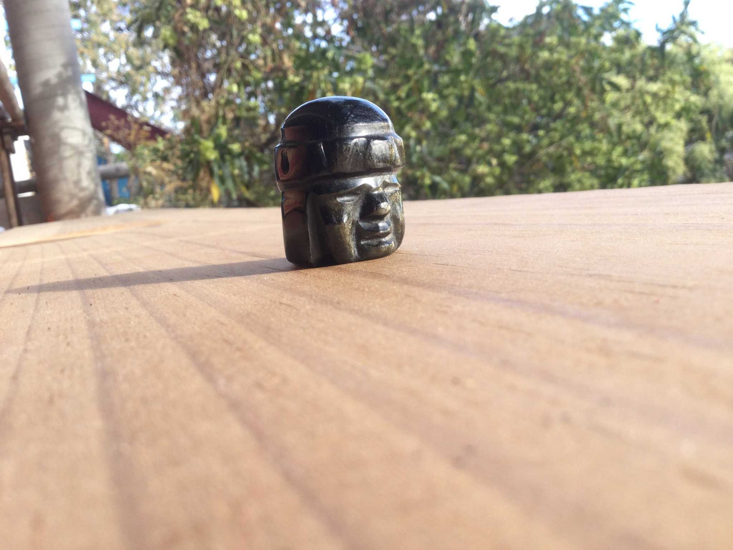 Olmec head pendant carved