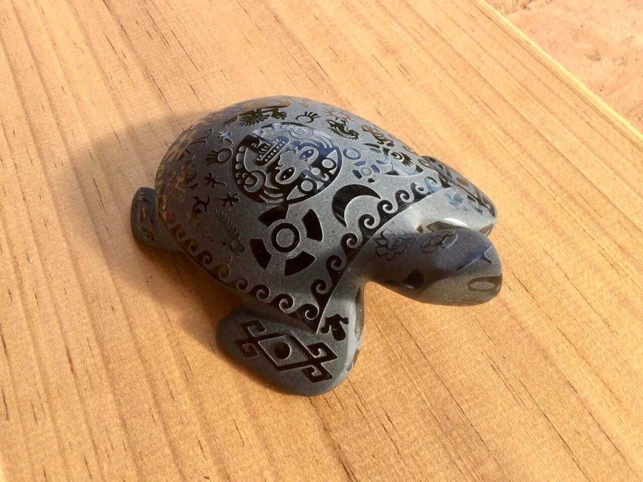 turtle carved obsidian stone sculpture engraved