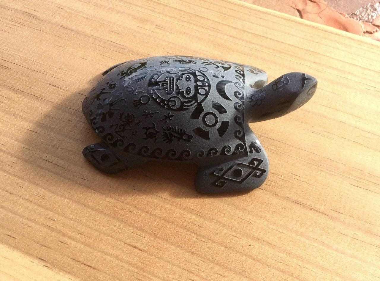 turtle carved obsidian stone sculpture engraved