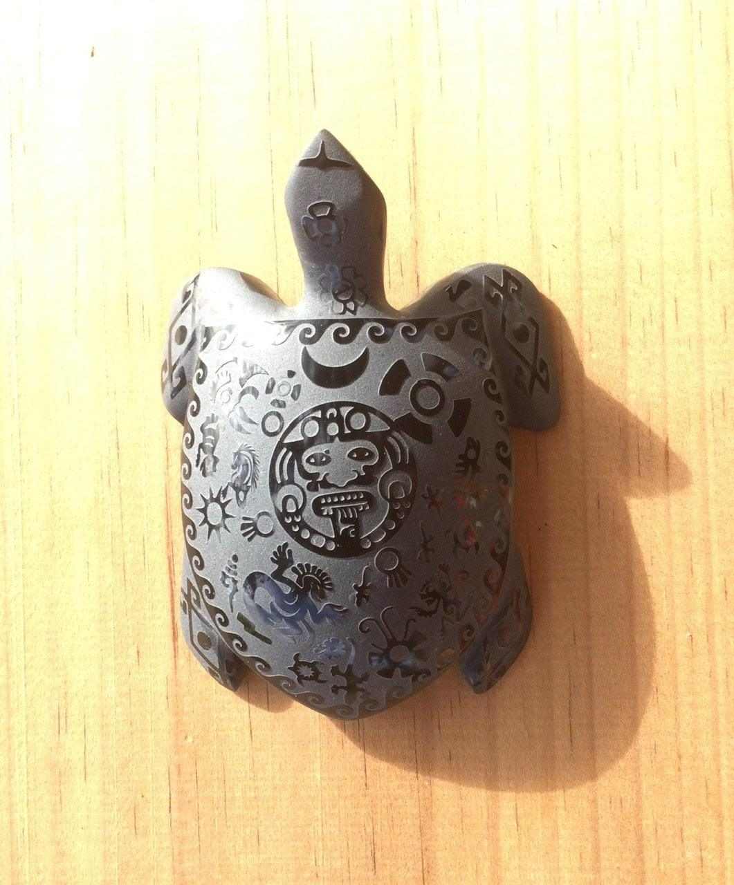 turtle carved obsidian stone sculpture engraved