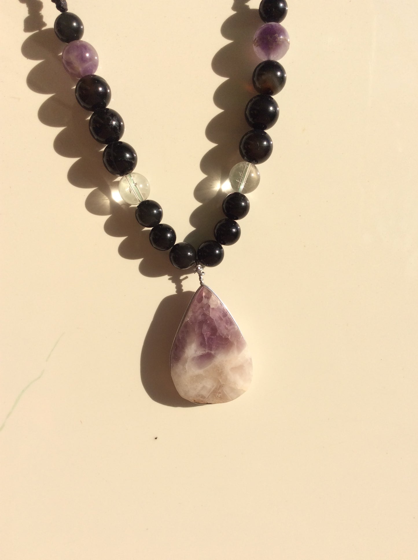 Amethyst & Obsidian Harmony Necklace: A Fusion of Calming Energy and Protective Power